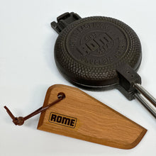 Load image into Gallery viewer, wood scraper tool shown next to pie iron