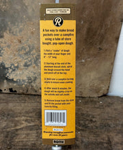 Load image into Gallery viewer, Bread & Biscuit Campfire Stick - Original By Rome closeup of backside of packaging card