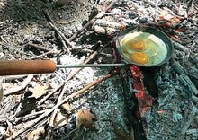Load image into Gallery viewer, Family Campfire Skillet Cast Iron - Original By Rome closeup cooking head with eggs 2