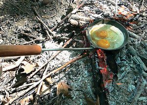 Cooking eggs with the family campfire skillet