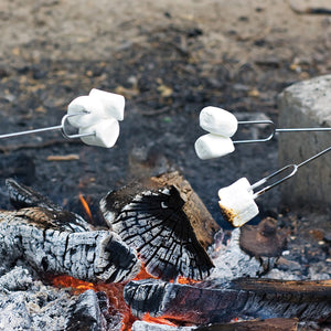 Marshmallow Forks with marshmallows over campfire
