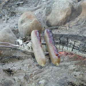 Big Stick Hot Dog Fork with brats over campfire