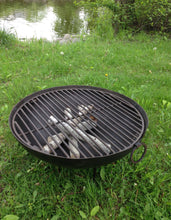 Load image into Gallery viewer, 23.5&quot; Dia. Stamped Steel Fire Pit W/ Grill Grate and Stand Nomadic Grill + Home outside view